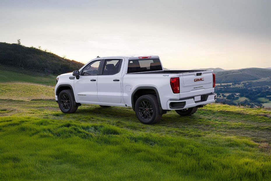 Rear Cross Side View of GMC Sierra LD in UAE