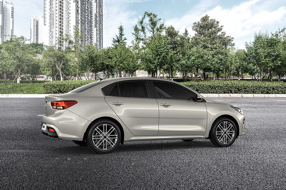 Rio 4-Door Rear Medium Side View in UAE